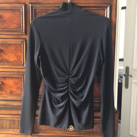 Black long sleeve top with ruffled back for something different. - Picture 3 of 4